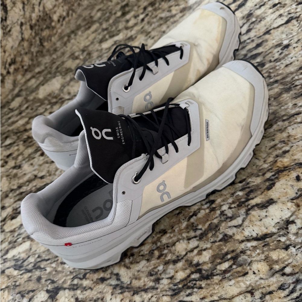 On Running Gray and Black Athletic Shoes